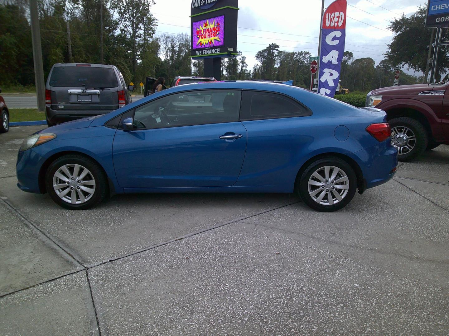 2014 BLUE KIA FORTE KOUP EX (KNAFX6A84E5) , located at 390 Hansen Avenue, Orange Park, FL, 32065, (904) 276-7933, 30.130497, -81.787529 - Photo#4